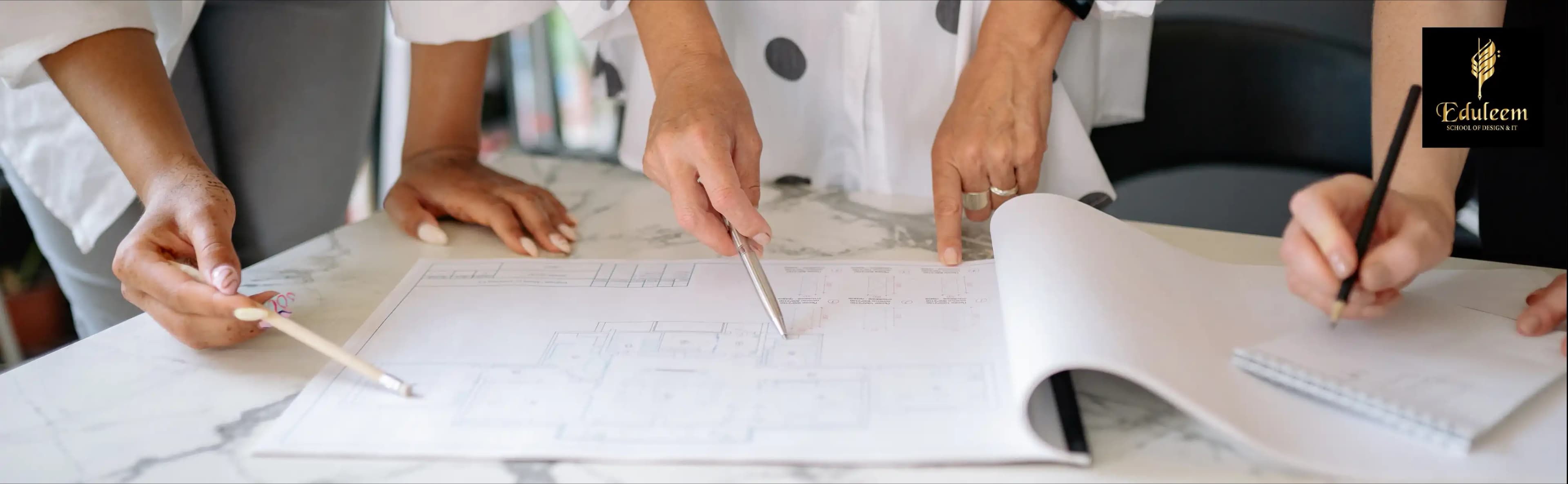 Students working on floor plans during an interior design course in Bangalore at Eduleem School of Design, showcasing hands-on interior design training.