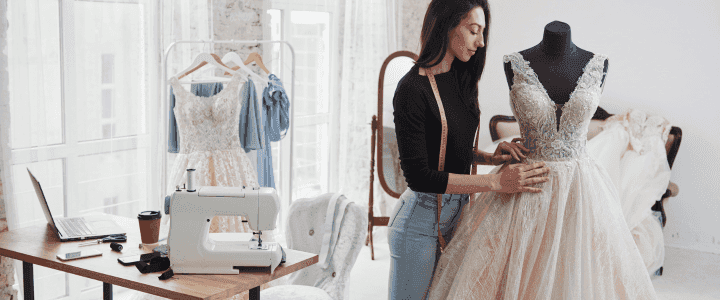 fashion designer making a gown